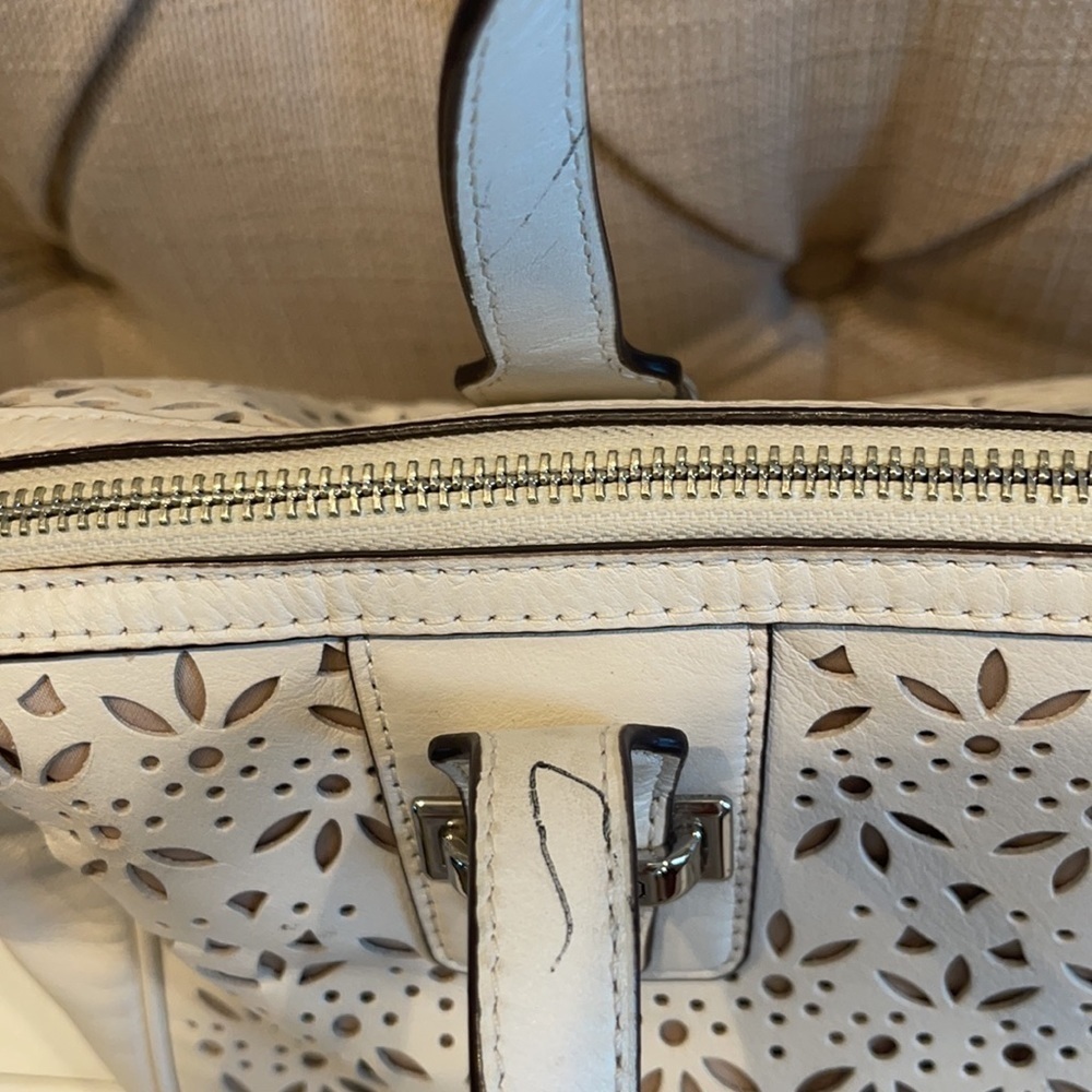 Coach Taylor Perforated Putty White Leather Satchel
12"L x 4.5"W x 8"H - Picture 7 of 11